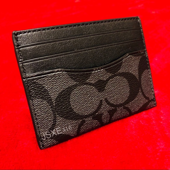 coach slim id card case in signature canvas